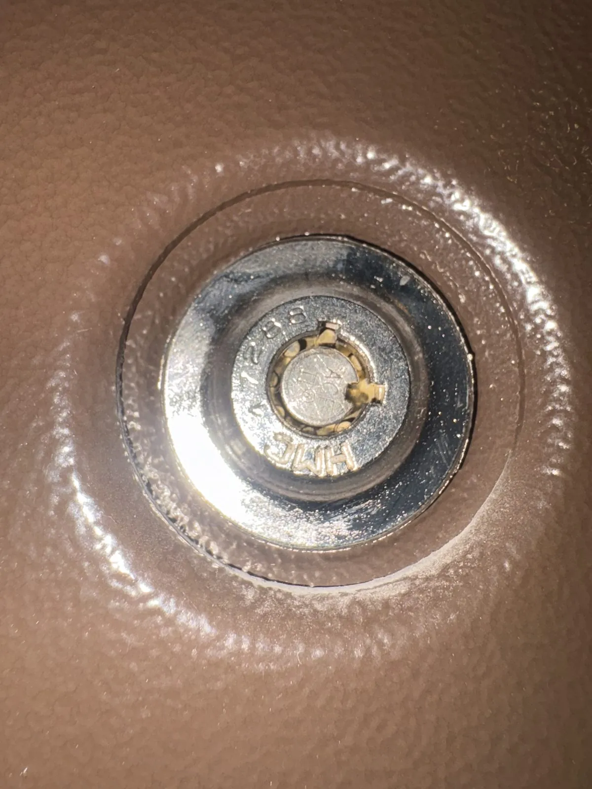 Car ignition lock cylinder removed for repair by a locksmith