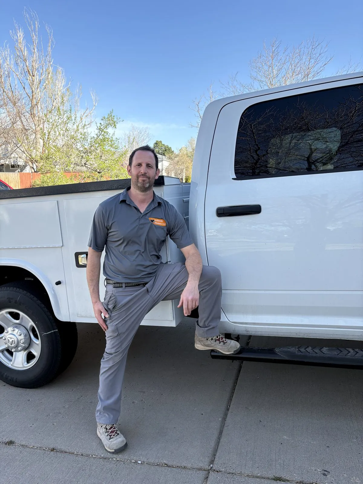 Locksmith Solutions LLC owner with the mobile work truck in Colorado Springs